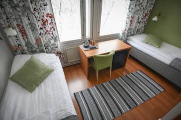 Фото номера Двухместный номер с 2 отдельными кроватями и ванной комнатой Курортные отели Kilpisjärven Retkeilykeskus Rooms г. Кильписъярви 6