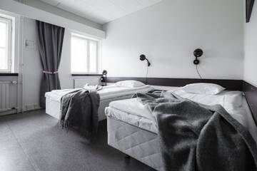 Фото номера Двухместный номер с 2 отдельными кроватями Отель Lapland Hotels Kilpis г. Кильписъярви 6